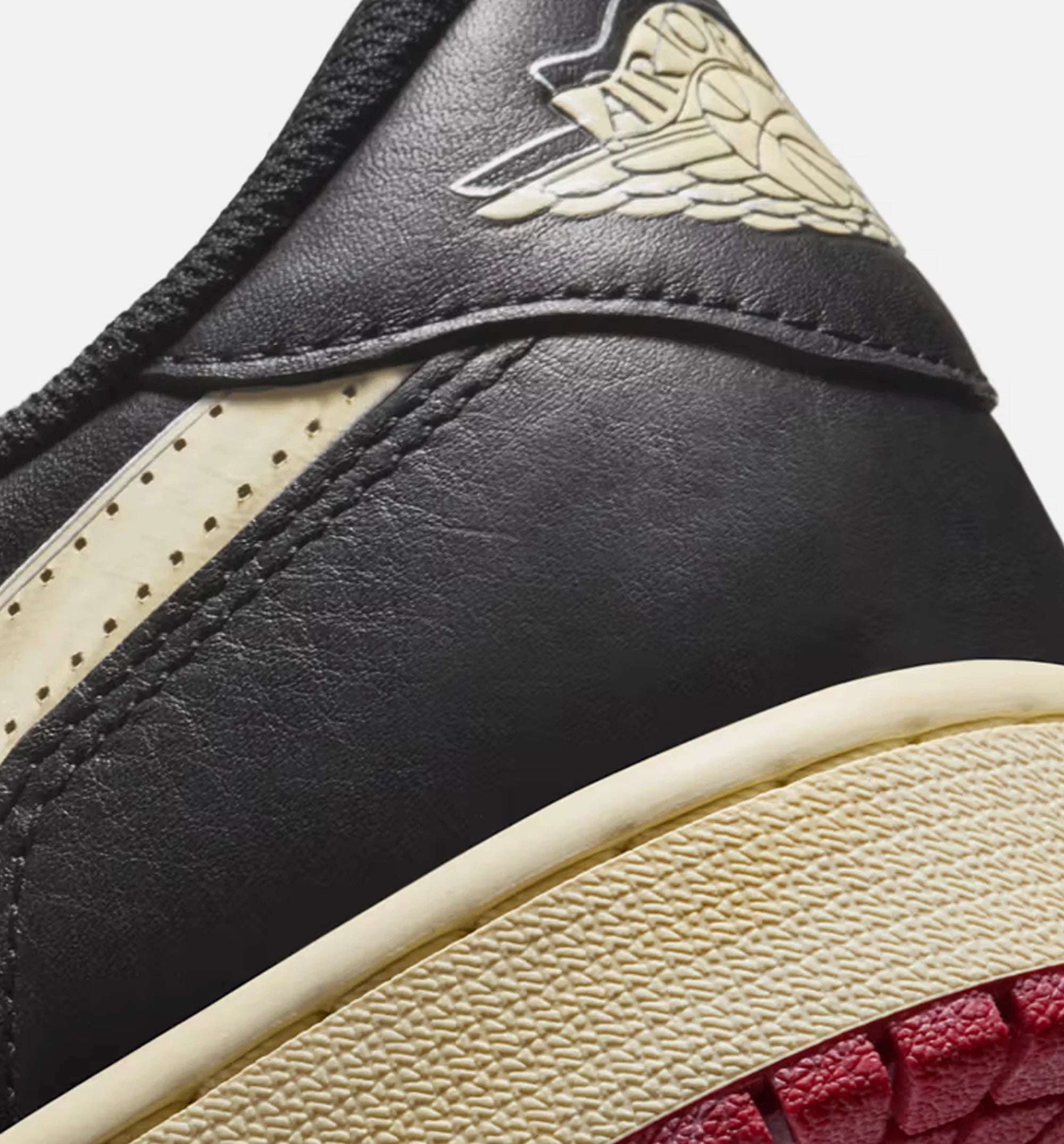 Nigel Sylvester x Air Jordan 1 Retro Low Nitro Mens Lifestyle Shoe Black Muslin Varsity Red Limit One Per Customer
