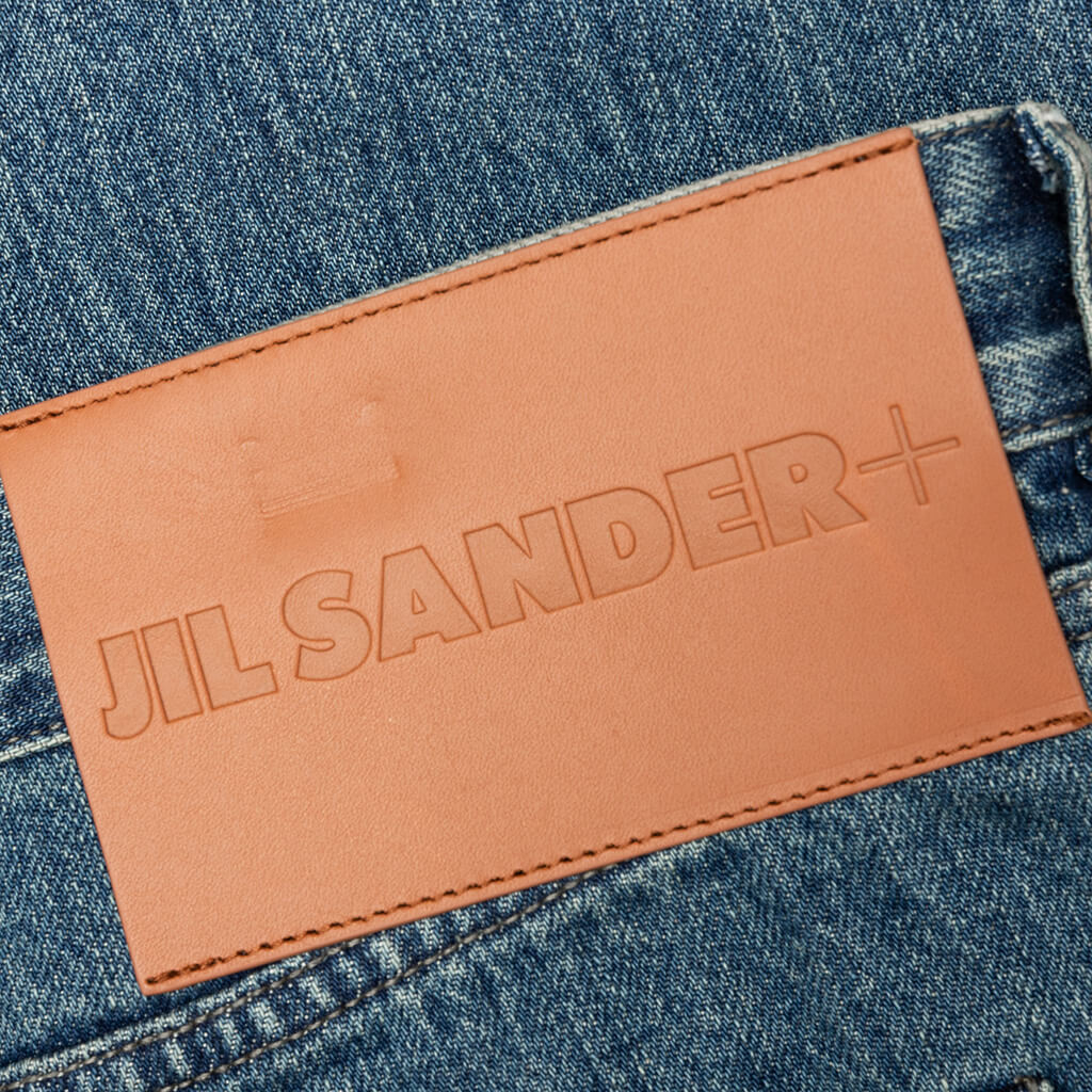 Washed and Bleached Raw Denim Trousers Blue